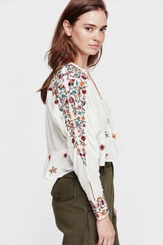 Free People Ava Embroidery Blouse - Ivory – shophearts Multicolor Embroidered Long Sleeve Top For Fall, Fall Floral Embroidered Long Sleeve Top, Long Sleeve Embroidered Top With Floral Embroidery For Fall, Long Sleeve Embroidered Top With Floral Design For Fall, Long Sleeve Blouse With Floral Embroidery For Fall, Folk Style Embroidered Top For Fall, Folk Style Embroidered Top With Embroidered Hem For Fall, Fall Folk Style Embroidered Top, Spring Long Sleeve Blouse With Multicolor Embroidery