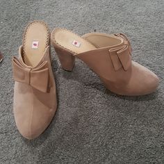 High Heeled Bootie/Clogs/Mules. Worn Once Indoors. There Are A Couple Of Small Indentations In The Heels From Storage. I'm A True Size 8 And These Are A Euro 39 And They Fit Perfect. Approx 3.5 In Heel. Chic Clogs With 4-inch Heel And Round Toe, High Heel Beige Clogs For Spring, Beige High Heel Clogs For Spring, Elegant Clogs With 4-inch Heel And Round Toe, Chic Beige Clogs With Round Toe, Chic Beige Round Toe Clogs, Beige Mules With Wooden Heel And Round Toe, Beige High Heel Clogs With Stacked Heel, Beige Clogs With Stacked High Heel