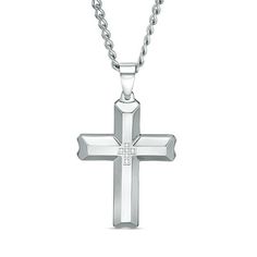 Celebrate his love of fashion with this classic diamond cross pendant. Fashioned in stainless steel, this clean-cut design features a cross-shaped arrangement of shimmering white diamonds atop a sculpted satin-finished cross. Polished bevelled edges lend further dimension to the look. Radiant with 1/20 ct. t.w. of diamonds and buffed to a brilliant luster, this pendant suspends along a 24.0-inch curb chain that secures with a lobster claw clasp. Luxury Diamond-cut Cross Necklace As Gift, Sterling Silver Diamond Cut Cross Necklace, Sterling Silver Diamond Cut Cross Pendant Necklace, Silver Sterling Silver Cross Necklace With Diamond Cut, Sterling Silver Diamond Cut Silver Cross Necklace, Sterling Silver Cross Necklace With Diamond Cut, Diamond Cut Cross Pendant Necklace, Stainless Steel Cross Pendant Jewelry For Anniversary, White Gold Polished Cross Necklace