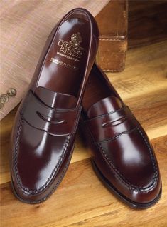 Classic Italian Moccasins For Semi-formal Occasions, Classic Burgundy Loafers With Rubber Sole, Classic Burgundy Leather Shoes With Rubber Sole, Classic Burgundy Loafers For Formal Occasions, Classic Burgundy Dress Shoes With Rubber Sole, Classic Burgundy Slip-on Dress Shoes, Classic Burgundy Dress Shoes For Galas, Classic Burgundy Loafers With Round Toe, Classic Burgundy Leather Shoes For Galas