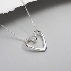 Sterling silver open heart pendant on fine sterling silver box necklace chain.  Necklace Size:  Please see sizing guide and select preference from drop down list Comes beautifully gift packaged with optional message cards Shipping Policies: Please see FAQs below Girlfriend Necklace Gift, Gift For Mom Birthday, Birthday Necklace Gift, Message Cards, Open Heart Necklace, Romantic Necklace, Box Necklace, Sterling Silver Cross Necklace, Sterling Silver Heart Necklace