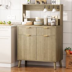 a kitchen with white tiles and wooden cabinets in the corner, next to a cutting board that has food on it