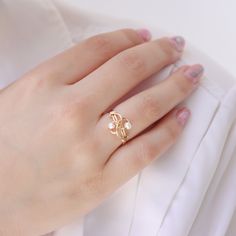 A unique ring with a classy touch just for you! Handmade with love, set with two fresh water pearls ☆ WHY THIS PIECE OF J E W E L R Y IS AWESOME! ☆ * Hand finished and made from high quality raw materials * Long lasting beauty & Timeless design * Available in Gold, Rose Gold or Sterling Silver ♡ WRAPPING ♡ * All 23 Summers jewels arrive in a cute pouch or gift box so they are gift ready. DELIVERY ✉ * Most items are ready made but some are made to order, Times for each items are shown on * We Knot Ring, White Band, Wire Wrapped Rings, Onyx Ring, Wrap Rings, Ring Collections, Pearl Ring, Gold Style, Unique Rings