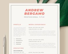 a clean and modern resume template on top of a desk with a pen, pencil and paper