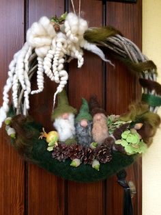 a wreath made out of wool and other things