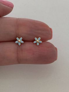 14K Yellow Gold Blue Daisy Flower Stud Earrings, Flower Earrings, Enamel Daisy Studs, Studs, 6MM Shiny Flower Studs ♦ Materials: 14K Solid Gold, Light Blue Enamel  ♦ Available colors: Yellow Gold  Light Blue ♦ Closure: Screw Backs ♦ Earrings Measurements: 6 Millimeters ------------------------------------------------------------------------------------------------- MATERIALS 14K Gold  PRODUCTION TIMES Order processing time varies between 1-2 business days, we work on our pieces daily All orders Cheap Light Blue Flower Earrings For Gift, Yellow Gold Flower Charm Earrings, 14k Gold Flower Earrings For Gift, Blue Sterling Silver Earrings With Flower Charm, 14k Gold Flower Earrings Jewelry, 14k Gold Flower-shaped Earrings, 14k Gold Flower-shaped Matching Earrings, 14k Gold Flower Earrings With Matching Set, Yellow Gold Flower-shaped Birth Flower Earrings