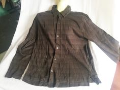 "Brown long sleeved top by DKNY. 100% Cotton weave dark brown blouse with rows of subtle tan and light blue pin dots. Button up front, collared and tailored looking. Says size S, but measures 20\" across middle so I would think it would fit a medium. Very soft material, super comfy! Please take a look at my storefront at: https://www.etsy.com/shop/FabFinds42?ref=seller-platform-mcnav I have a wide selection of one-of-a-kind items, from clothing and toys to home decor and gift items, and I add ne Dark Brown Blouse, Alien Clothes, Dark Brown Top, Pink Summer Dress, Pink Dress Casual, Brown Blouse, Business Tops, Blue Pin, Long Sleeved Top