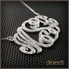 "Our Cutoff Date for Christmas delivery is Sunday Dec. 13, 2020 All Order placed after this date will be completed for mid January delivery. Personalized gold and diamond monogram necklace 1.0\" inch high, 1.5\" wide and about 1mm thick, made of solid 14kt. white gold and has a total of 0.80ct. in diamonds. The necklace suspends from a cable Link chain with 3 choices of length: 14\",16\" and 18\". The Monogram can be made with the initials of your choice. Please use the note section available at Custom Silver Necklace With Diamond Accents For Anniversary, Silver Custom Necklace With Diamond Accents For Anniversary, Elegant Jewelry For Anniversary Gift With Hallmarks, Silver Engraved Diamond Custom Necklace, Anniversary Monogram Jewelry In Cubic Zirconia, Diamond Jewelry With Hallmarks For Gift, Formal Elegant Name Necklace With Diamond Accents, Custom Silver Diamond Necklace Engraved, Luxury Sterling Silver Name Necklace For Formal Occasions