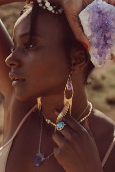 Our most popular crystal fringe statement earrings now come with Amethyst crystals. These unique tassel earrings look stunning when the light dances off of them! They are the perfect bridal or bridesmaids earrings or would make a great gift for yourself or a girlfriend. Amethyst is a stone of intuition, connecting you to your inner wisdom, empowering you to trust yourself! Amethyst crystals *color of purple amethyst is lighter purple and ranges in lightness Gold fringe earrings Weight: .22 oz Dr Crystal Fringe, Bridesmaids Earrings, Gold Fringe, Amethyst Crystals, Inner Wisdom, Raw Amethyst, Amethyst Jewelry, Mala Necklace, Fringe Earrings