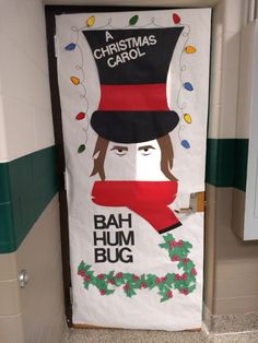 a door decorated with a christmas carols theme and the words bah hum bug