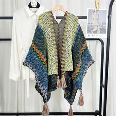 Vacation Casual Knitted Cardigan Capes Women Shawl JacketsLength:60cmWidth:115cm Multicolor V-neck Outerwear For Fall, Knitted Acrylic V-neck Sweater Coat, Multicolor Knitted V-neck Cardigan, Casual Knitted Outerwear One Size, Bohemian Knit V-neck Cardigan, Bohemian V-neck Knit Cardigan, Knitted V-neck Acrylic Sweater Coat, Casual Acrylic Yarn Outerwear For Winter, Casual Acrylic Yarn Winter Outerwear