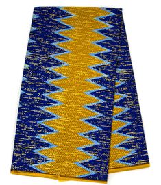 Trendy 100% cotton Kente cloth fabric in gold and royal blue adorned with metallic gold accents, inspired by traditional African designs. Ideal for special occasions, such as African weddings and religious gatherings. Please note that the actual color may appear differently on your monitor. Measurement: Print is 4 yards and Solid is 2 yards. Width is 46 in. Texture: 100% Soft Cotton Care: Hand wash or spot clean. May contain more colors than mentioned above. Royal Gold Traditional Wear With Traditional Drape, Royal Gold Traditional Wear For Festive Season, Blue Cotton Traditional Wear With Printed Border, Blue Traditional Cotton Wear With Traditional Patterns, Blue Cotton Traditional Wear With Traditional Patterns, Blue Traditional Wear With Traditional Patterns In Cotton, Traditional Blue Fabric For Festivals, Blue Traditional Drape Fabric For Festivals, Gold Cotton Traditional Wear With Drape