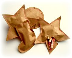 an origami cat made out of brown paper