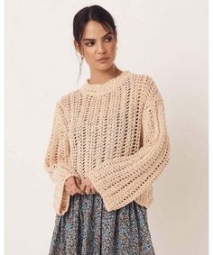 A versatile layering piece, our Saskia Knit Jumper was designed to be a throw on knit for those fresh summer nights, watching the sun set with a cocktail in hand. With a thick, open knit and a cropped, boxy fit, it’s the perfect companion over shorts or a dress. In a warm honey tone, you’ll find it pairs back with just about anything in your wardrobe. - Crafted from a combination of 86% organic cotton and 14% linen- Slightly flared sleeves- Ribbed neckline Campaign model is wearing a S Spell Clothing, Spell Designs, The Spell, Flare Sleeves, Sun Set, Ribbed Neckline, Crop Blouse, Knitted Jumper, Knit Jumper