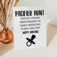 a card that says, happy hunting there are feathers hidden throughout the shower whoever finds the most, wins a prize