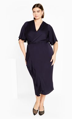 The Soft Ruffle Dress brings a refreshing style with a charmingly chic style. Designed with feature ruffle detail, a deep faux wrap pleat V neckline and textured sateen feel stretch, this dress is destined to turn heads. Key Features Include: - Deep faux wrap pleat V-neckline - Short flutter sleeves - Elasticated back waistband - Faux wrap drape skirt - Feature ruffle detail - Pull over style - Textured sateen feel stretch fabrication - Satin lined Love this piece with a pair of emerald-hued hee Surplice Neckline Ruffle Wrap Dress For Party, Surplice Neckline Wrap Dress With Ruffles For Party, Party Wrap Dress With Ruffles And Surplice Neckline, Elegant Ruffle Sleeve Midi Dress For Date Night, Elegant Wrap Dress With Surplice Neckline For Brunch, Elegant Draped Midi Dress For Brunch, Elegant Midi Dress With Ruffle Sleeves For Date Night, Chic Short Sleeve Faux Wrap Dress, Ruffled Wrap Dress For Party