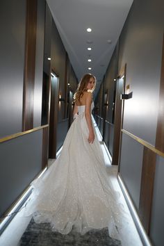 A sleeveless gown highlights your delicate features, with a semi-sweetheart corset and a luxurious floor-length skirt. The gentle sparkling bow at the back adds a touch of romance, while the glittering bodice creates a chic, royal look. Important info: the width of the lacing area on the back of the wedding dress can range from 1" to 6", depending on measurements and the level of tightening. Olivia Bottega, Glitter Skirt, Sweetheart Corset, Glitters Skirt, Glitter Shorts, Detachable Skirt, Sparkle Wedding Dress, Gown Skirt, Delicate Features