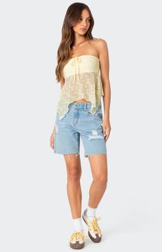 Online only! Whether you want to wear this top on its own for your next beach vacation, or throw it over your favorite swimsuit, the Edikted Embroidered Sheer Strapless Top is the perfect fit to give you vacation vibes all summer. 


	Top
	Asymmetric hem
	Strapless fit
	Lined bust
	Front tie detail
	Sheer embroidered fabric
	Polyester, Spandex
	Model wears size S
	Model height is 5'9
	Item care: Wash with similar color Visionary Fashion, Vacation Vibes, Embroidered Fabric, Asymmetric Hem, S Models, Model Height, Pacsun, Beach Vacation, Polyester Spandex