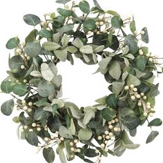 a wreath with green leaves and white berries