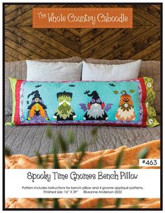 the pillow case is made to look like it has been decorated with witches and pumpkins