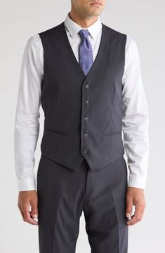 Bring understated elegance to the table in this three-piece suit crafted from rich fabric in a classic single-breasted silhouette. Jacket has notched lapels; chest welt pocket; front flap pockets Vest has front button closure; V-neck Pants have zip fly with button closure; front slant pockets; back button-welt pockets Jacket and vest are lined; trousers are lined to the knee 65% polyester, 35% viscose Dry clean Imported Suit has a 6” drop, meaning that a size 38R jacket is paired with size 32 pa Classic Tailored Three-piece Suit For Work, Classic Suits With Single Button And Flat Front, Classic Notch Lapel Sets For Business Meetings, Professional Single Breasted Three-piece Suit For Semi-formal Occasions, Semi-formal Slim Fit Single Breasted Suit Accessories, Tailored Three-piece Suit For Semi-formal Events, Tailored Three-piece Suit For Semi-formal Occasions, Classic Tailored Three-piece Suit For Office, Classic Tailored Three-piece Suit For Semi-formal Occasions