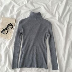 Basic ribbed knit turtleneck long sleeved shirt. Stretches to fit. One size fits S-L 27"-37" chest 21.5" length Long Sleeved Shirt, Knit Turtleneck, I Got This, Turtleneck Sweater, Ribbed Knit, Gray Color, Long Sleeve Shirts, Turtle Neck, Knitting