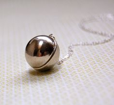 A silver plated orb/ball locket opens to hold two small photographs.  It dangles from a delicate sterling silver chain. ~18" chain Modern Locket, Simple Locket, Wife Gift Ideas, Necklaces Minimalist, Unique Locket, Orb Necklace, Simple Necklace Everyday, Necklace Everyday, Long Silver Necklace