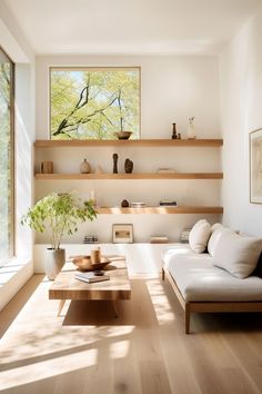 a living room filled with furniture next to a large window covered in lots of sunlight