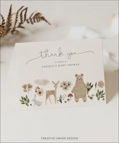 a thank card with an image of two deers and one bear in the background