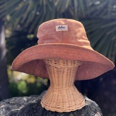 "A wide brim sun hat for beach days and summer fun.  This sun hat for women has a nice wide brim to protect your whole face and even your neck and chest.  This hat folds up so it is easy to bring along in your bag.   This hat is made from a medium weight homespun linen and cotton blend fabric in a rust color.  Inside liner is white cotton.  I used a stiff interfacing for brim to keep it's shape. A sun hat for beach days and summer fun.  This sun hat for women has a nice wide brim to protect your Cheap Adjustable Wide Brim Bucket Hat, Summer Hats With Curved Brim For Sunbathing, Lightweight Bucket Hat With Curved Brim For Sunbathing, Lightweight Hats With Curved Brim For Sunbathing, Lightweight Curved Brim Hat For Sunbathing, Adjustable Summer Sun Hat In Orange, Adjustable Orange Sun Hat For Summer, Coastal Sun Hat With Upf 50+ For Sunbathing, Beachy Sun Hat, One Size Fits Most