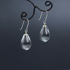 "These Small clear teardrop earrings are made of glass in lampwork technique. The earrings hooks are sterling silver and are hypoallergenic. These unique and beautiful earrings are like water drops frozen in glass! They are simple and elegant, very lightweight and comfortable to wear, perfect for everyday wear and for special occasions. 💕 You will definitely receive lots of compliments on your new earrings, everybody loves them, and you'll love them too! Dimensions: total length about 1 1/8\" i Gray Gemstones, Small Drop Earrings, Water Drop Earrings, Droplet Earrings, Glass Drop Earrings, Tear Drop Earrings, Earrings Everyday, Minimal Earrings, Classic Earrings