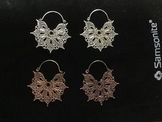 Delicately hand made earrings in shimmering white brass or copaper. Silver Copper Drop Earrings, White Copper Earrings As Gift, Vintage White Earrings For Festive Occasion, Silver Copper Hoop Earrings Gift, Handmade Copper Gold Flower Earrings, Silver Copper Hoop Earrings, Handmade Gold Flower Earrings In Copper, Handmade White Metal Earrings, Silver Copper Earrings For Party