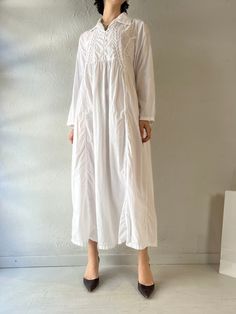 - Vintage April Cornell long sleeve maxi dress - 100% cotton - Shell buttons of the front - Made in India - Tagged S  Bust: 22" Length: 49" We are not responsible for lost, stolen, or damaged packages once they have been shipped. Any additional customs duties or taxes incurred on international orders are the responsibility of the buyer. Please note that our items are vintage and may have minor flaws or imperfections due to their age, which adds to their unique character. White Semi-stitched Anarkali Set Maxi Length, White Semi-stitched Maxi Kurta, White Long Folk Kaftan, White Maxi-length Kaftan For Loungewear, White Oversized Maxi-length Kaftan, April Cornell, Casual Indian Fashion, Dress 100, White Cotton