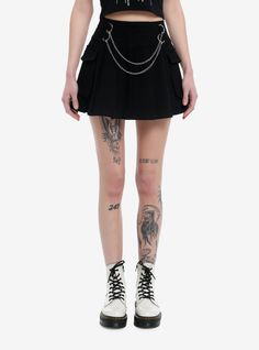 Black is always in. Step into warmer temps looking like a baddie in this pleated skirt! Comes with cargo pockets on the sides and double chain detailing across the front. Back zipper closure.97% cotton; 3% spandexWash cold; dry flatStretchy materialLength: 15''ImportedListed in junior sizesModel is 5'10''Model wears size Small Skirt With Chains, Emo Skirt, Hot Topic Shoes, Wishlist 2024, Skirt With Belt, Tall Hoodies, Plus Size Swim, Plus Size Fits, Birthday Wishlist