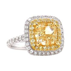 From the Vault at Emilio Jewelry, located on New York's iconic 5th Avenue, Center stone: a gorgeous fancy yellow diamond weighing just over 2.30cts certified as fancy yellow with no overtone. Clarity vvs2! Set in 18k with another .70ct of F color vs2 diamonds. If you have another design in mind please share it with us. Please inquire for additional details, certificates, pricing, or any other questions. Emilio is an expert in natural fancy colored diamonds, precious gems, and specializes in only Emilio Jewelry, Fancy Yellow Diamond Ring, Radiant Cut Diamond Ring, Green Diamond Rings, Yellow Diamond Ring, Cushion Cut Diamond Ring, Diamond Rings With Price, Yellow Diamond Rings, Fancy Yellow Diamond