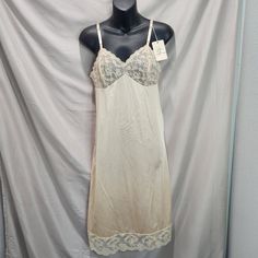 Nwt And A Rare Find! Pit To Pit: 17in Pit To Hem: 32in Adjustable Straps Tag Size 32l Vintage Slip Dress For Wedding Night, Sheer Vintage Slip Dress, Vintage Style Summer Night Slip Dress, Vintage Sheer Slip Dress, Vintage Lace Camisole Sleepwear, Vintage Cream Slip Dress, Vintage Lace Trim Slip Dress For Night, Fitted Sheer Cream Nightgown, Fitted Beige Sleepwear With Lace Trim