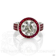 a red and white diamond ring on a white background