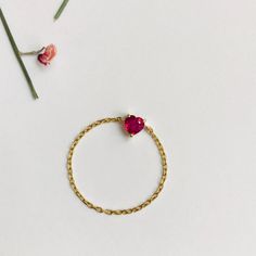 These heart shaped Ruby chain rings are to die for. It's a gorgeous gem that symbolizes strength & love. Not only the perfect present for Valentine's Day, but perfect for everyday. This ring is perfect by itself or stacked with some of our other rings for a personalized look.  Our chain rings are our best sellers. Minimalist Gemstone Jewelry For Valentine's Day, Yellow Gold Jewelry For Valentine's Day, Oval Stackable Jewelry For Promise, Fine Ruby Heart Jewelry, Fine Jewelry Heart-shaped Birthstone, Fine Ruby Heart-shaped Jewelry, Heart Cut Ruby Jewelry In Yellow Gold, Yellow Gold Heart Cut Ruby Jewelry, Valentine's Day Anniversary Jewelry With Cable Chain