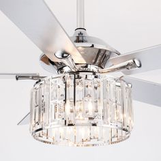 Upgrade your home with this 52-in chrome chandelier ceiling fan. It featuring a drum light embellished with crystal shade. Five silver and wood grain double finishes blades with reversible motor provide plenty of airflow by remote control. 2 E26 bulbs provide bright, sparkling light. This lighted chandelier ceiling fan is the perfect solution for your cooling and lighting needs. Six fan speeds and reversible blades keep you comfortable year-round. The included handheld remote makes it easy to co Chrome Ceiling Fan, Chandelier Ceiling Fan, Crystal Ceiling Fan, 52 Inch Ceiling Fan, Indoor Chandelier, Drum Light, Ceiling Fan Light Kit, Chandelier Fan, Chrome Fixtures