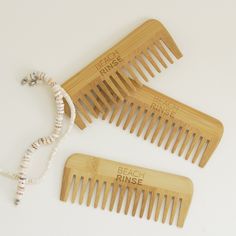 The perfect pick for your luscious locks! This wide tooth hair comb is 100% bamboo. It's ocean friendly (zero plastic), sustainable, and better for oil distribution on your scalp! Wide tooth combs are an excellent choice for Beach Rinse hair. Since we want to keep the natural look, this allows you to tame your mane without fussing over it too much. This wide tooth comb allows you to pick at it gently and distribute oils more evenly, while keeping that effortless ocean-tossed look. Size: 5"x2" Bamboo Comb, Hair Rinse, Wide Tooth Comb, Natural Look, Hair Comb, Comb