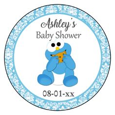 a baby shower sticker with an image of a blue teddy bear holding a star