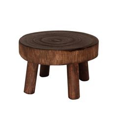 a small wooden stool sitting on top of a white background