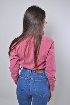 "Women vintage pink long sleeve casual blouse, Size M Welcome to TARASCOMMON.ETSY.COM Unique clothing from the 20th century. Model tall - 170cm M. 38 - size on the tag. Sleeve - 50cm / 19.68inch; ( armpit to end of sleeve); Width - 43cm / 16.92inch; Length - 60cm / 23.62inch. All measurements are taken seam to seam while lying flat. This item is vintage, so it can have some defects. Additional photos can be send We are glad that you are interested in lots that we sell. Wish you a good shopping! White Lace Blouse, Unique Clothing, Embroidery Blouse, Vintage Kimono, Pink Long Sleeve, The 20th Century, Vintage Shorts, Pink Shirt, Unique Outfits