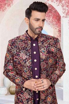 This Mens Sherwani features a multi-color thread embroidery and sequin work, creating a stunning open jacket design. With its traditional yet modern appeal, this sherwani is perfect for weddings and formal occasions. Elevate your style with this expertly crafted piece. Mens Sherwani, Jacket Design, Formal Occasion, Multi Color