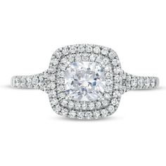 a cushion cut diamond ring with double halos