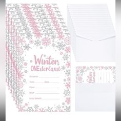 a set of four pink and silver snowflake themed winter onederand cards