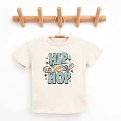 Looking for a cute tee for your kids? We have the perfect Hip Hop Skateboard graphic tee addition to their closet! Also available in youth tees. Casual Screen Print Tops For Playtime, Trendy Letter Print Tops For Playtime, Casual Graphic Print Tops For Playtime, Trendy Graphic Print Tops For Skateboarding, Graphic Tee Tops With Screen Print For Playtime, Casual Letter Print T-shirt For Playtime, Spring Letter Print T-shirt For Playtime, Unisex Casual T-shirt For Playtime, Hip Hop Tops With Letter Print For Skateboarding