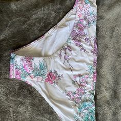 This Bikini Bottoms Are White With Pastel Flowers On Them. They Are Brand New With Tags And The Hygiene Liner. By The Way The Tag On The Inside Is It Is Quite Possible They Are Reversible But Even If They Aren’t Supposed To Be I’m Sure They Would Be Completely Fine Being Reversed To The White Side With The Pattern On The Top Band. White Stretch Bottoms For Beach Party, White Summer Bottoms For Pool, White Bottoms For Poolside Vacation, White Beachy Bottoms For Beach Party, White Poolside Bottoms For Vacation, Beachy White Bottoms For Beach Party, White Tropical Print Tankini For Vacation, White Tankini With Tropical Print For Vacation, White Tropical Print Tankini For Spring