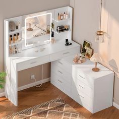 a white desk with drawers and lights on it