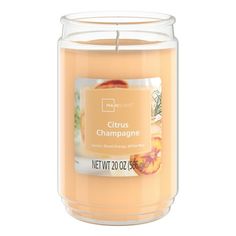 Introduce a soothing aroma into your living space with the Mainstays Citrus Champagne Scented 3-Wick Glass Jar Candle. Place this candle in the kitchen, living room or dining room where you can enjoy it when entertaining guests or anytime you want to relax. Mainstays offers a wide selection of candle scents to explore and enjoy. Shop all of our Mainstays scents online and in-store. Size: 20 oz.  Color: Orange. Citrus Candle, Cream Candles, Candle Scents, Wishlist 2024, Glass Jar Candles, Citrus Scent, Jar Candle, Kitchen Living Room, Entertaining Guests